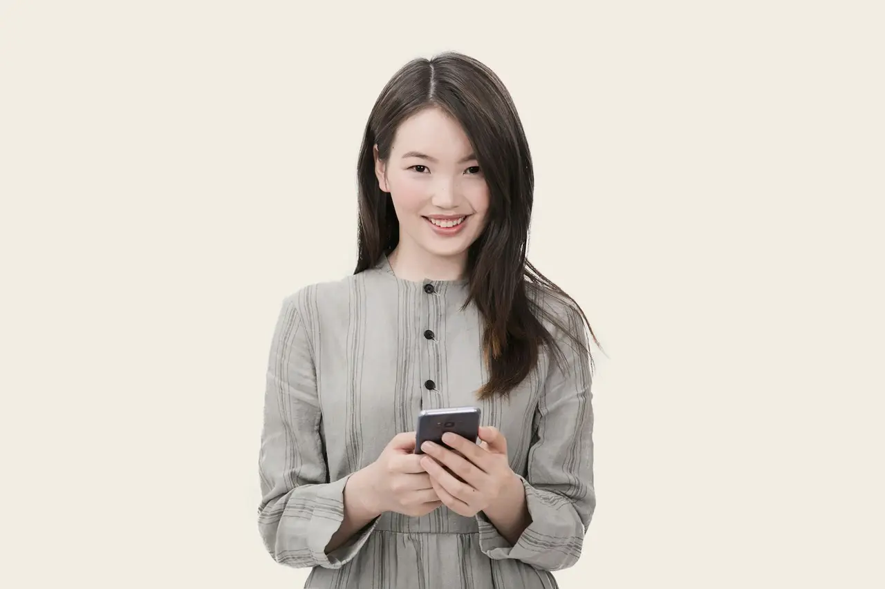 手機畫面顯示 LINE Premium 訂閱方案頁面，165 元定價清晰呈現